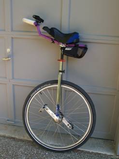 My pride and joy. 29" wheel, geared hub, dual-drilled cranks, T7 handlebar, mobile phone holder, tool-kit, and air seat.